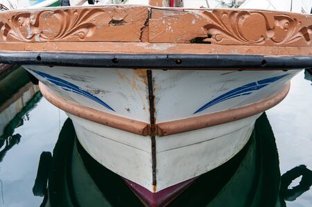 A fishing boat that looks like a laughing person's faceの写真素材