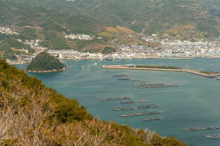 Seto Inland Sea bays lined with farmed salmon