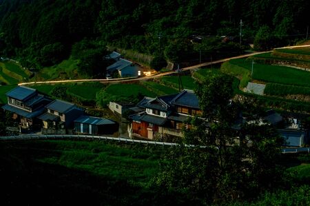 Villages illuminated by full moon moonlightの写真素材