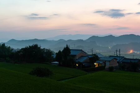 Countryside landscape with dawn skyの写真素材