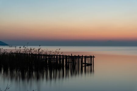 Lake Biwa with orange sky at dawnの写真素材