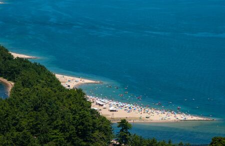 The blue sea and sandy beach of the Sea of Japan