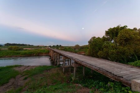 A bridge over a river in Kyotoの写真素材