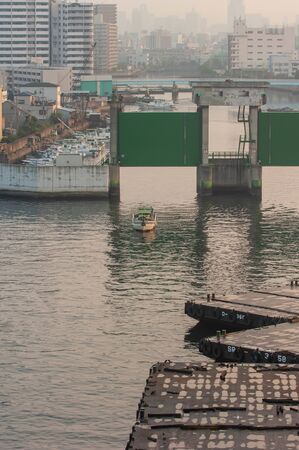 The canal gate seen from a huge bridge in Osaka