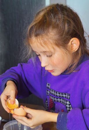 little girl cookingの写真素材