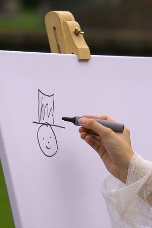 bride drawing her prince charmingの写真素材