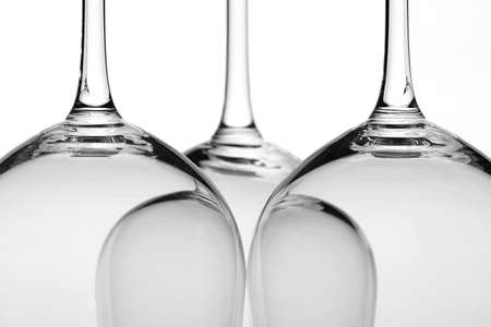 three wine glasses in backlight close-upの写真素材