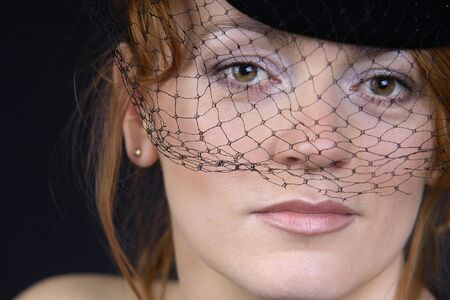 portrait of a beutiful lady in hat with weilの写真素材