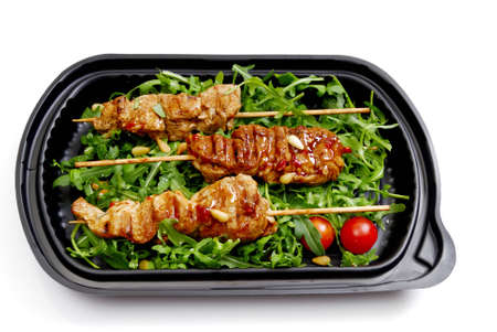Turkey breast on rucola in a box.
の写真素材