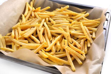 Pommes on a baking sheetの写真素材