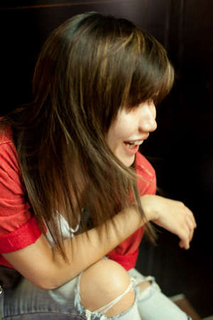 A happy smiling asian woman
