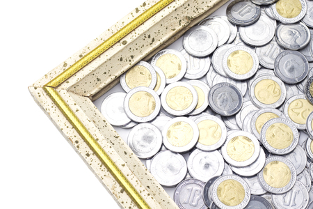 silver and golden coin Algeria money in golden wooden frameの写真素材