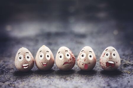 delicious pink chocolate easter eggs with funny cartoon face , holiday conceptの写真素材