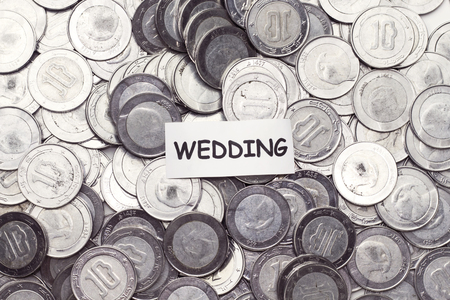 save money concept, tag wedding above algeria coinの写真素材