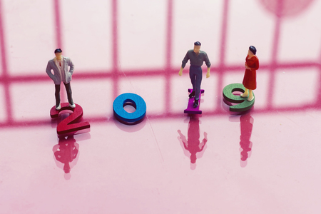 small business people standing on colorful wooden numbers forming the number 2019, For the new year...