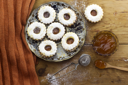 traditional algerian  linzer cookies with apricot jam on plate for holidayの写真素材