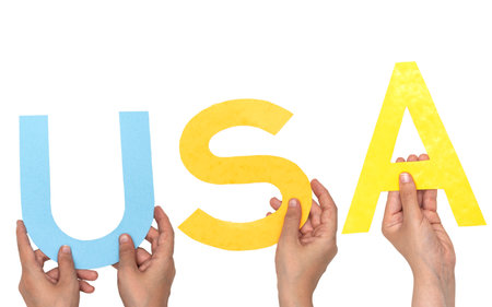 closeup hands people forming USA or United state of america text with colorful lettersの写真素材