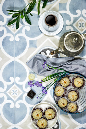 Oriental Algerian sweet cookies named Touma in Arabic language mean garlic in english in old metal...