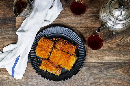 Traditional homemade arabic sweets (dessert kadaif, kunafa, baklava), ramadan kareem concept
