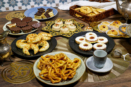 happy Eid Al fitr Concept, group of different tradition coookies of algeria on wood table for ramadan or eidの写真素材
