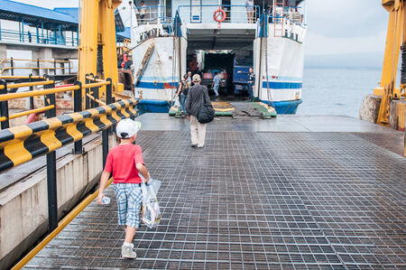 Bali, Indonesia, April 23,2010 : Tourist at ferry pier for take ferry to Java in Bali,Indonesia.のeditorial素材