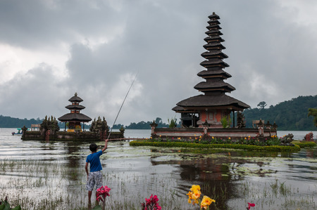 Bali, Indonesia, April 22,2010 : Scene of Pura Ulun Danu temple at Beratan lake  in Bali,Indonesia.のeditorial素材