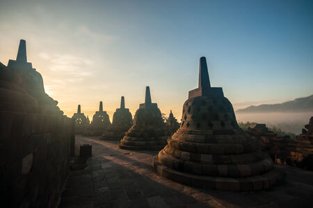 Yogyakarta,Indonesia - April 27,2010 : Tourist visiting   Borobudur Temple at sunrise  in Yogyakarta Java Indonesia. Borobudur Temple is one of the most visited temple in Indonesia.のeditorial素材