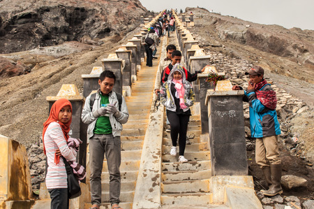 Java,Indonesia-Arpil 25,2010 : Tourists hiking to Mount Bromo,The active Mount Bromo is one of the most visited tourist attractions in East Java , Indonesia.のeditorial素材