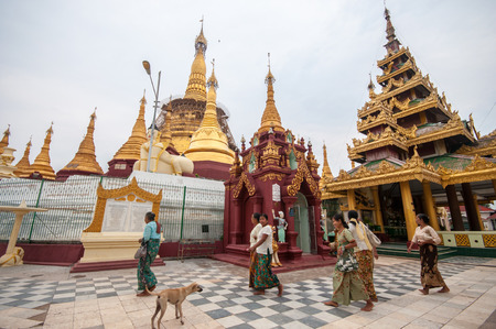 Yangon, Myanmar - March 14, 2011: Myanmar people walking around the Kyaik Khauk Pagoda temple in Syriam, Yangon , Myanmar.のeditorial素材