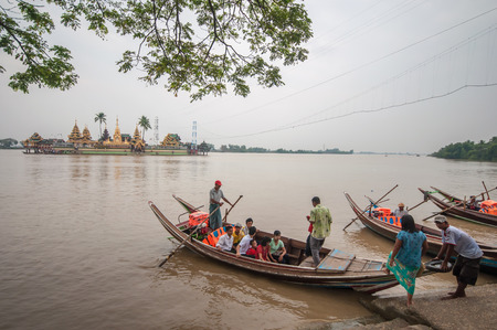 Yangon, Myanmar - March 14, 2011: The boat transport from main land to Yele Phaya temple (Pagoda on a small island) in Syriam, Myanmar.のeditorial素材