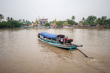 Yangon, Myanmar - March 14, 2011: The boat transport from main land to Yele Phaya temple (Pagoda on a small island) in Syriam, Myanmar.のeditorial素材