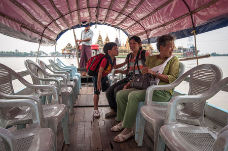 Yangon, Myanmar - March 14, 2011: The boat transport from main land with tourist to Yele Phaya temple (Pagoda on a small island) in Syriam, Myanmar.のeditorial素材