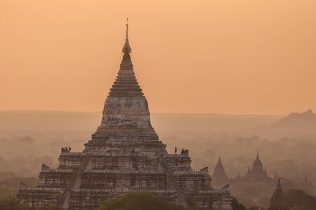 Bagan,Myanmar-March 19,2011 : Unidentify people on the Shwesandaw Pagoda with plain of temples of...