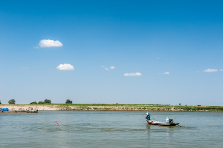 MandalayMyanmarMarch 172011 : Unidentified Myanmar  Transport ship transporting people across the Irrawaddi river in Mandalay Myanmar.のeditorial素材