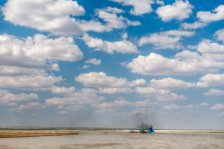 MandalayMyanmarMarch 172011 : Unidentified Myanmar  Transport ship transporting goods across the Irrawaddi river in Mandalay Myanmar.のeditorial素材