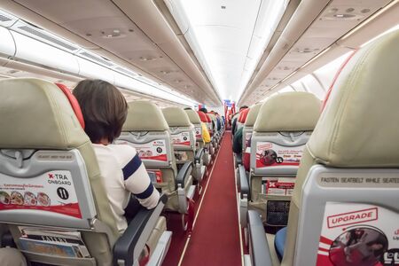 Bangkok- November 20,2015 : Unidentified travellers in Thai AirAsia X Airbus A330-300 interior. Thai...