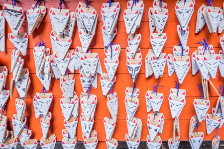Kyoto, Japan- November 28,2015 :  Wishing Fox Face at Fushimi Inari Taisha, the Shinto shrine famous for its thousands of vermilion Torii gates, which straddle a network of trails in Kyoto, Japan.のeditorial素材