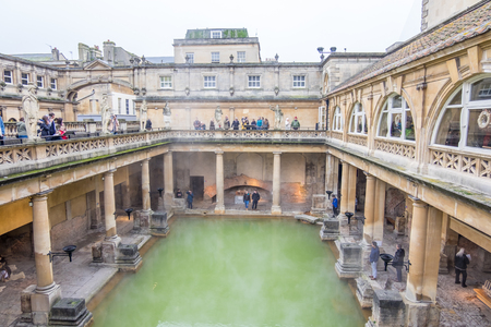 Bath, UK - December 18, 2016: View of inside Historic Roman Baths with Bath Abbey in the Historic Somerset ,Bath city ,United Kingdom.のeditorial素材