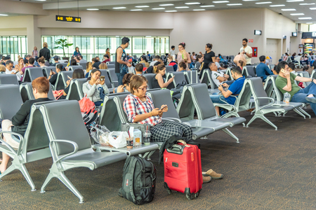 Bangkok Thailand , April 2, 2018 : Unidentified passenger in waiting room at Don Mueang international airport in Bangkok,Thailand.のeditorial素材