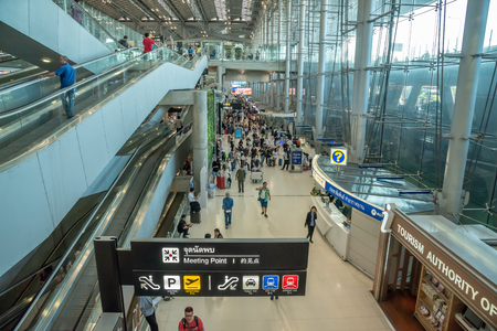 Bangkok,Thailand - April 13,2018 : The passengers in blur motion arriving at meeting point arrival terminal of Suvarnabhumi international airport,Bangkok,Thailand.のeditorial素材