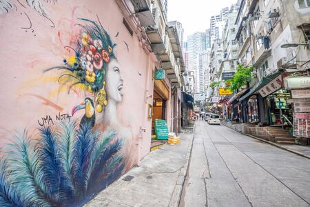 Hong Kong - May 4,2018 : Hong Kong street art ,Graffiti (building picture) on the wall is a common...