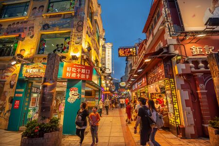 Macau,China - May 5,2018 : The famous food street at Rua do Cunha with traditional Europe Style house at Taipa Village Macau.のeditorial素材