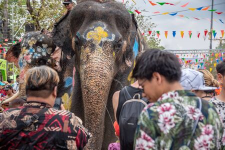 Ayuthaya, Thailand - April 15, 2019 : Elephant and peoples are splashing water in Songkran festival(water festival) in Ayutthaya, Thailand.のeditorial素材