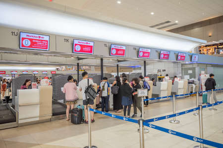Bangkok, Thailand - April 04, 2019 : Interior with passenger check in at Thai Lion air counters in Don Mueang International Airport, Bangkok, Thailand.のeditorial素材