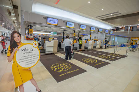 Bangkok, Thailand - April 04,2019 : Interior with passenger check in at Nok air counters in Don Mueang International Airport, Bangkok, Thailand.のeditorial素材