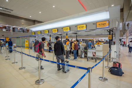 Bangkok, Thailand - April 04, 2019 : Interior with passenger check in at Nok air counters in Don...