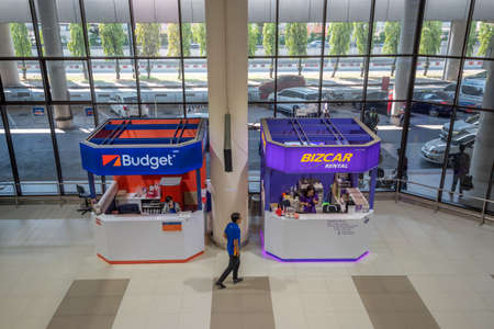 Bangkok,Thailand - April 04,2019 : The rent a car desk at arrival terminal of  Don Mueang International Airport.のeditorial素材