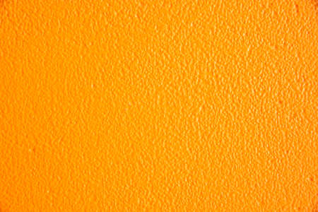 Vivid orange wall texture background, image vintage style for backgroundの写真素材