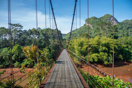 The suspension bridge to see the Heart shape of the mountain, Surat Thani, Thailandの写真素材