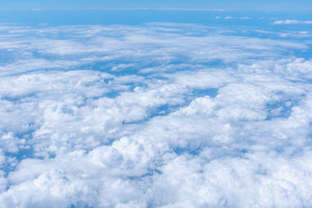 blue sky background with beautiful natural white cloudsの写真素材